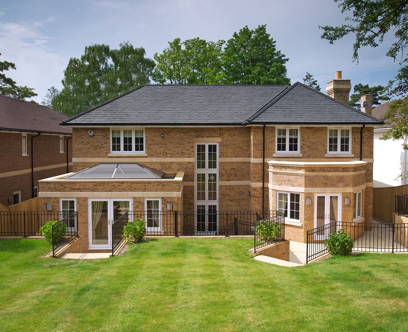 Home with a glazed extension and roof lantern