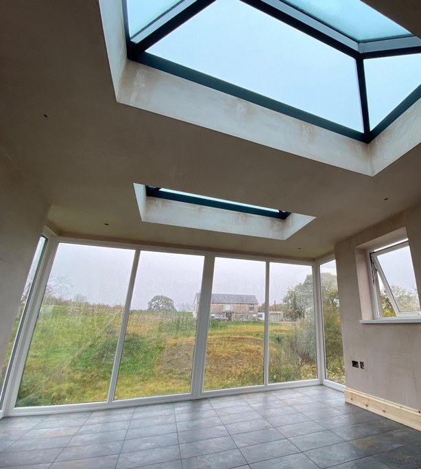 Finished glazed extension interior with roof lanterns